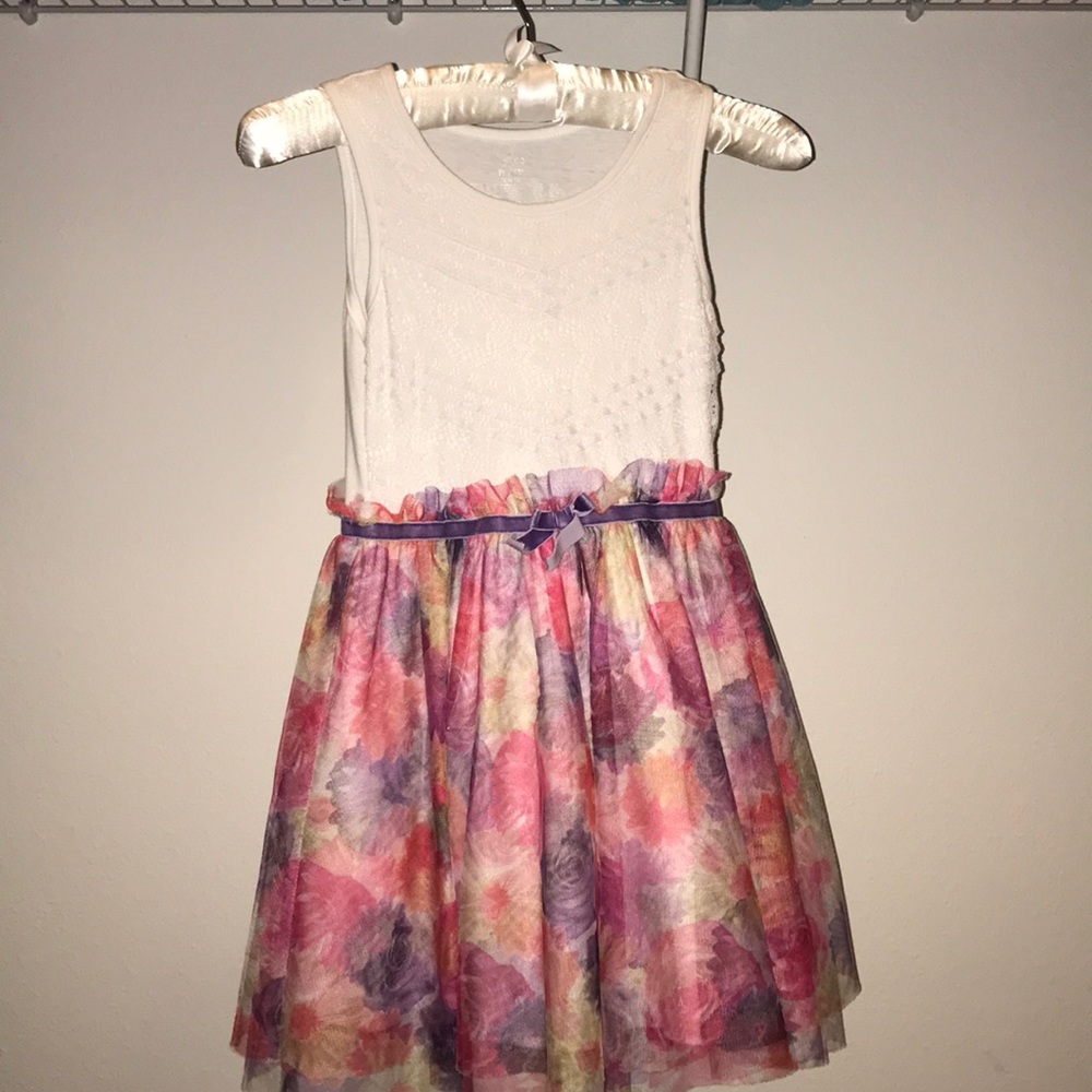 New white lace dress and floral pattern.